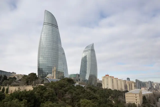 The Flame Towers rising above the trees