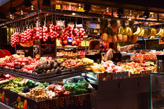 A colourful fruit stall at La Boqueria market