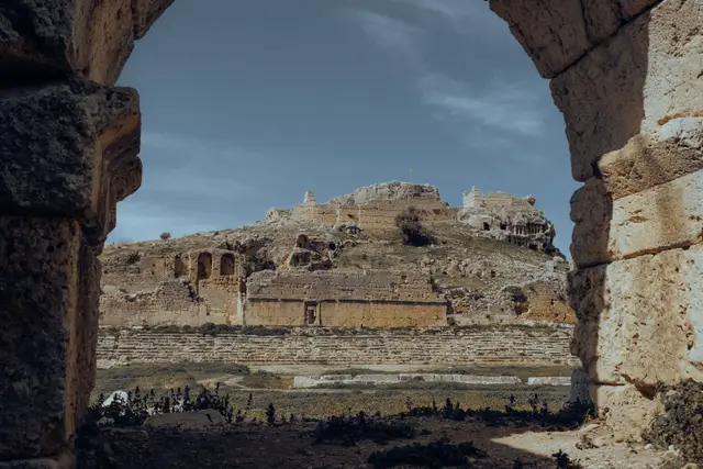 The ruins of ancient Tlos seen through a stone arch