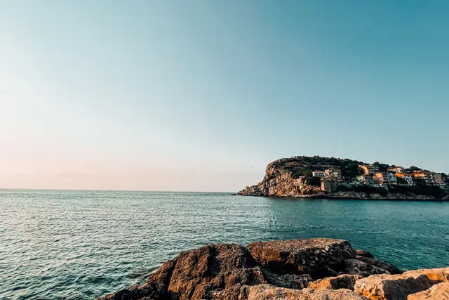 Amasra's rocky shore and island towards sunset
